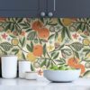 0056480 ochre clementine garden peel and stick wallpaper.jpeg