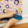 0065314 multi purple leopard spots peel and stick wallpaper.jpeg