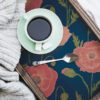 0085958 navy pink poppy field peel and stick wallpaper.jpeg