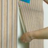 0086280 natural slat wood peel and stick wallpaper.jpeg