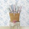 0087800 blue bella ribbon everblooming rosettes peel and stick wallpaper.jpeg
