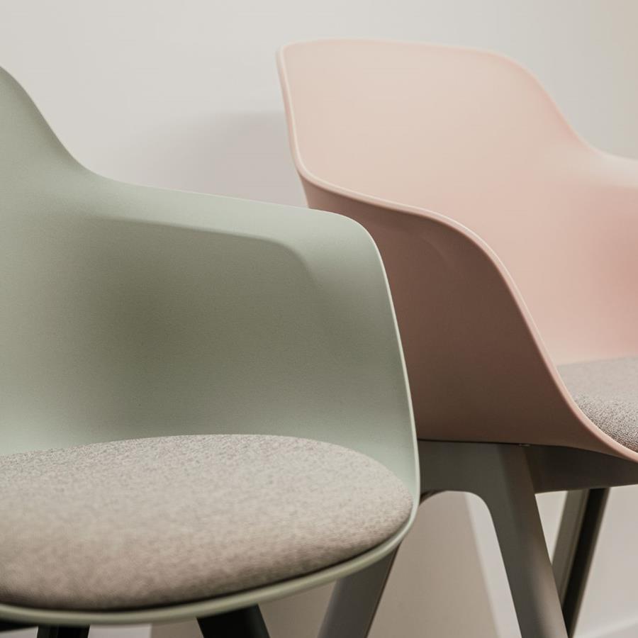 Moulded shell chairs in grey and pink Gabriel upholstery