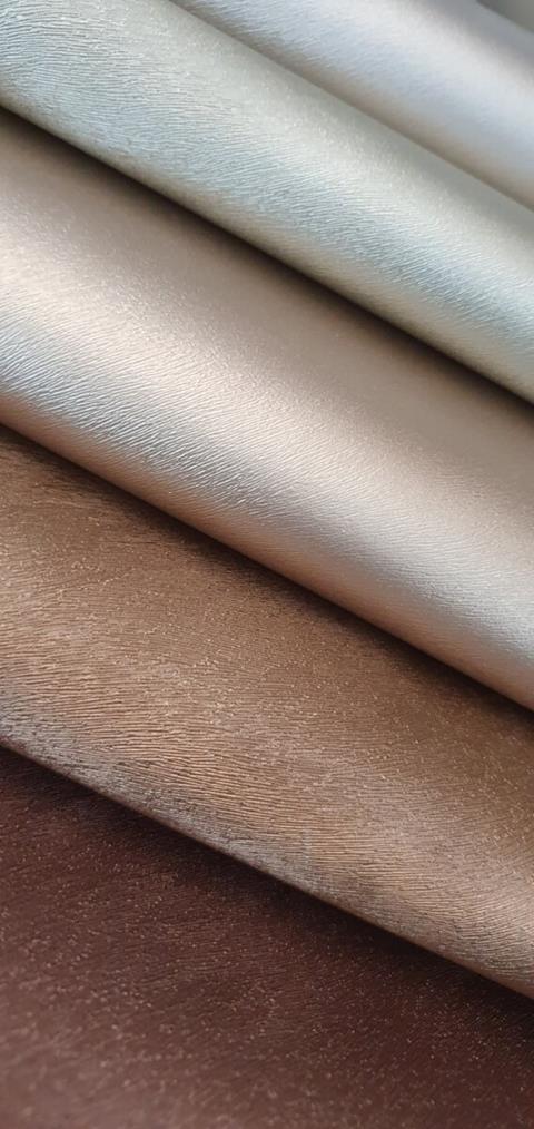 Rolled samples of Peloso in metallic tones