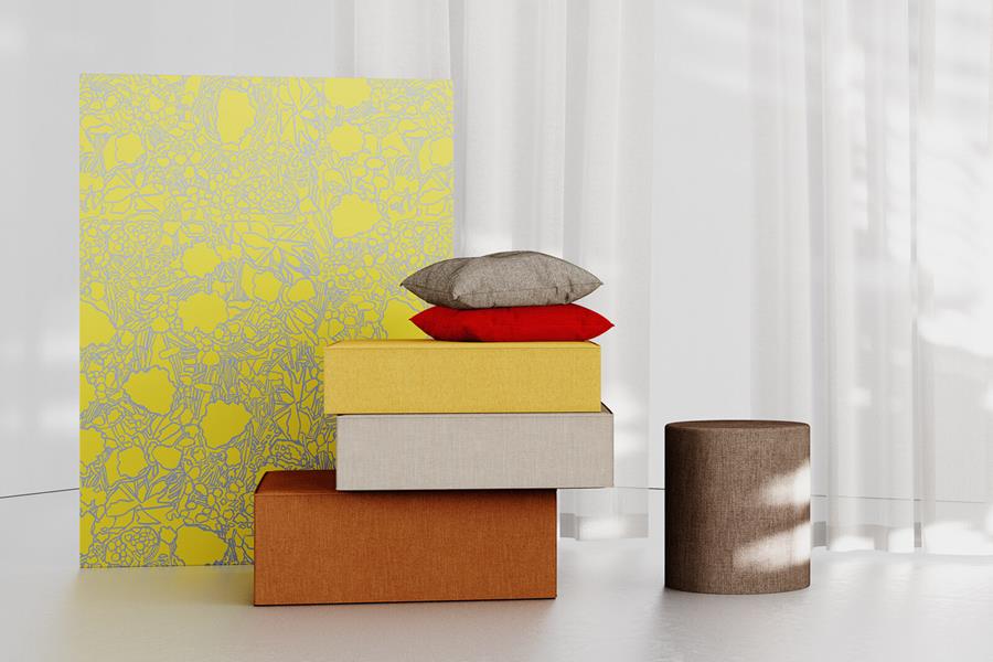 Stacked books and a vase in front of a chartreuse Crypton fabric