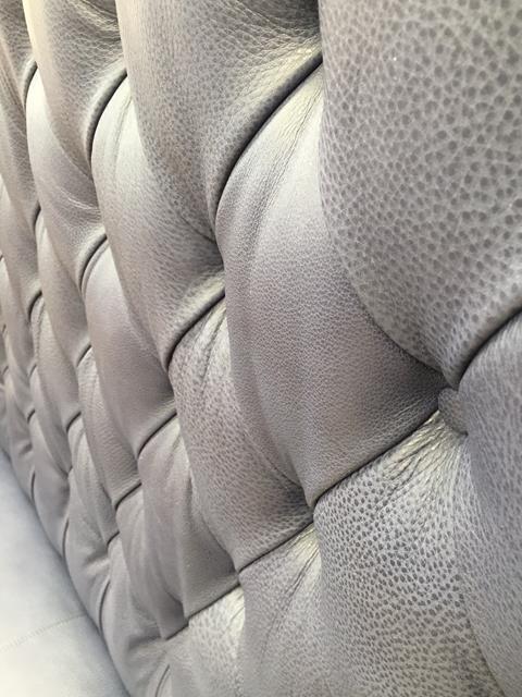 Close-up of a buttoned leather panel
