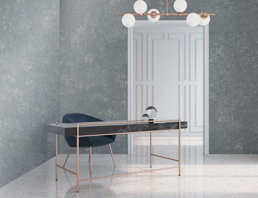 Study with a textured grey commercial wallcovering, desk and globe pendant