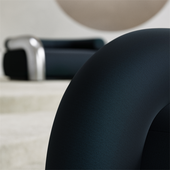 Close-up of a navy chair in Gabriel Beyond Loop
