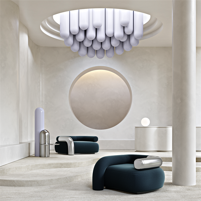 A round chair in Gabriel Beyond Loop beneath a sculptural light