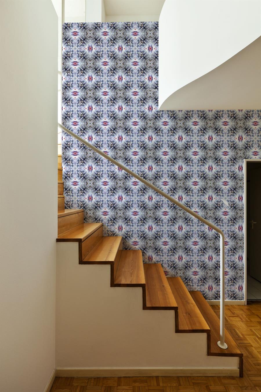 A stairwell wall in a blue and white Newmor pattern