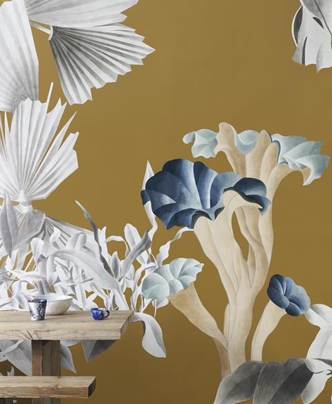 White and blue flowers painted on a saffron ground