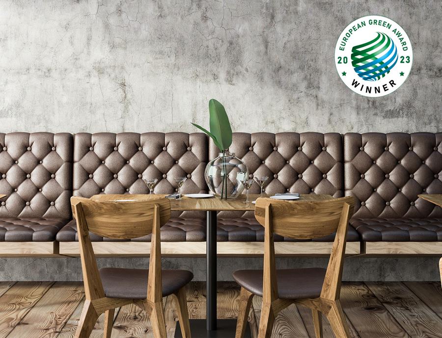 A café bench in dark skai Vyp Coffee with the European Green Award badge