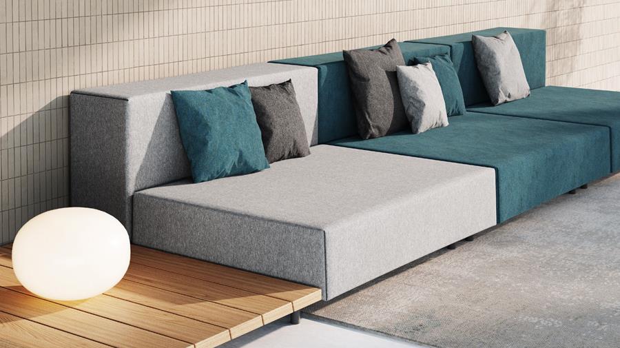 A low modular sofa in grey and blue Designtex upholstery