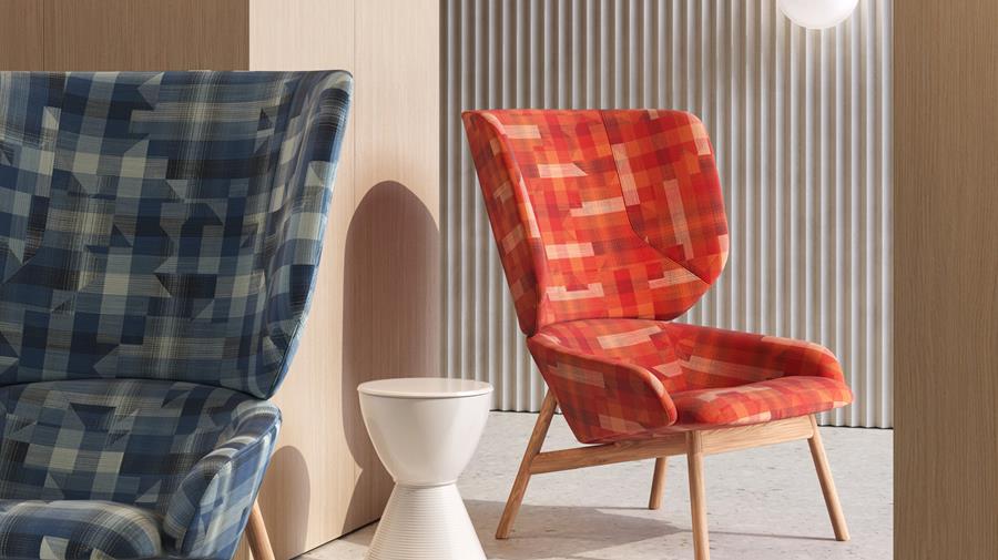Armchairs in a blue pattern and a red Designtex fabric