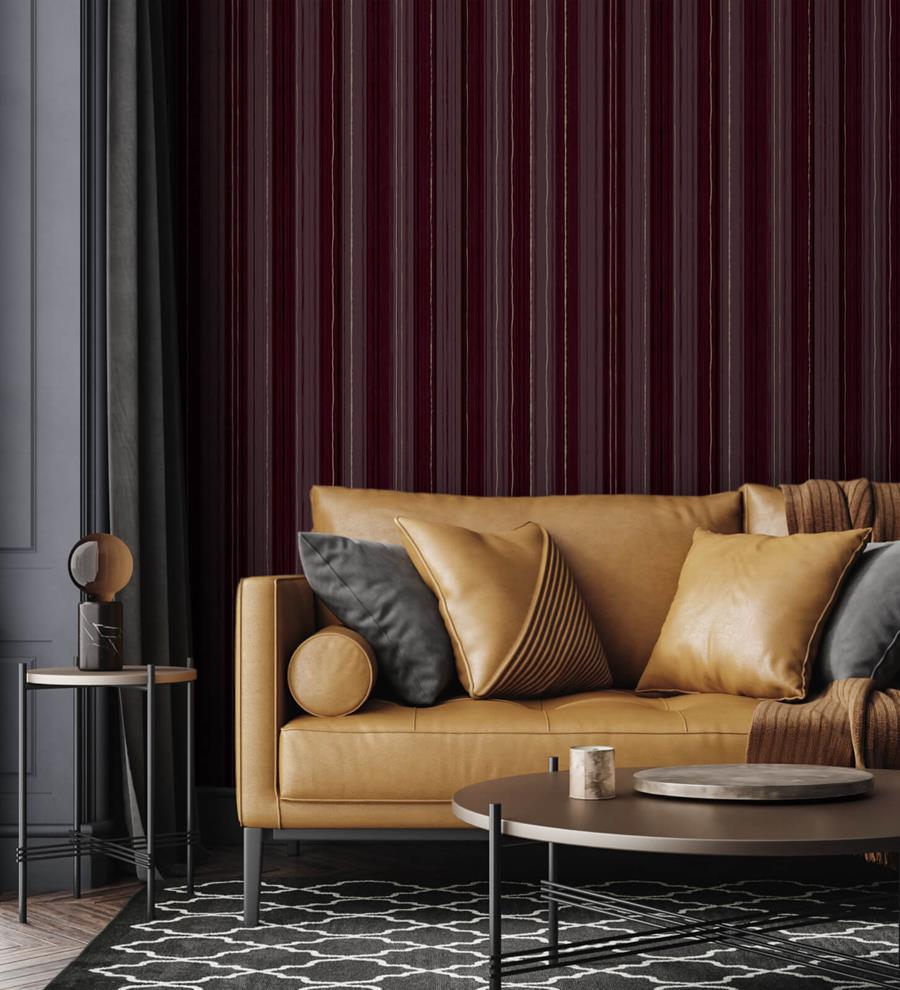 Living room with a tan leather sofa against a dark striped Newmor wallcovering