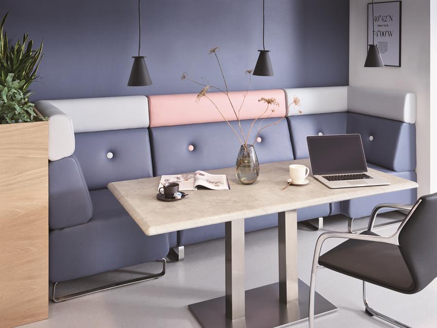 Office booths with grey-blue skai seating around a table