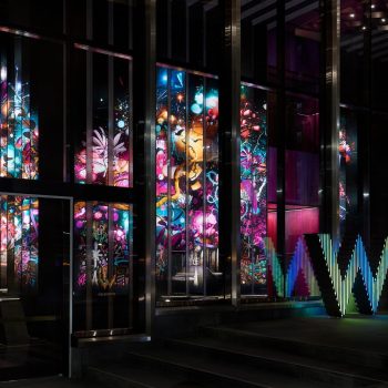 W Melbourne: backlit printed panels in the hotel lobby, with the W sign