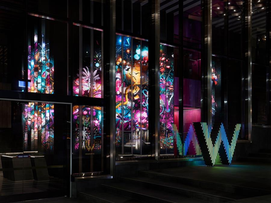 W Melbourne: backlit printed panels in the hotel lobby, with the W sign