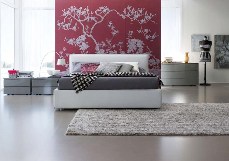 Bedroom with a hand-painted silk feature wall in deep red