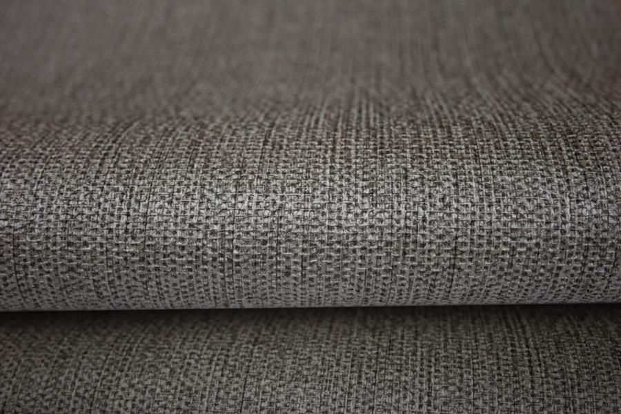 A roll of grey Newmor Oxford wallcovering