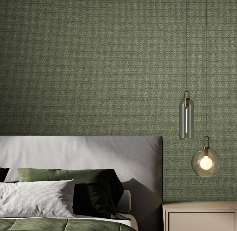 Bedroom with green Newmor Prism wallcovering behind the bed and a pendant light