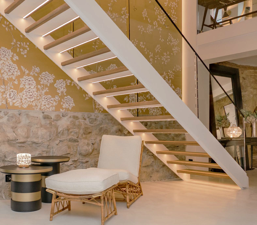 Staircase lined with hand-painted silk panels