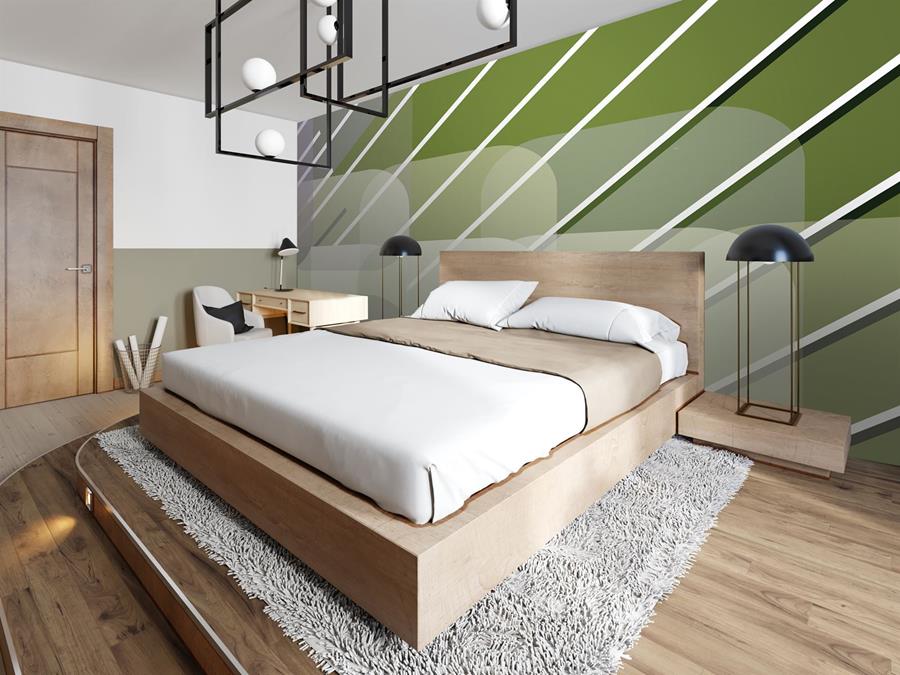 A bedroom wall in olive diagonal stripes