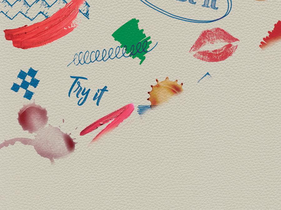 skai Toronto EN: pale vinyl marked with lipstick, ink and pen