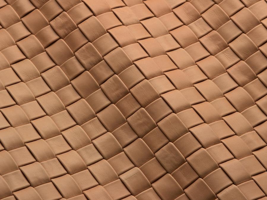 Close-up of woven tan leather