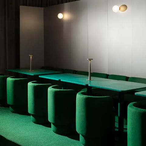 Bar Adrenalina, Milan: green upholstered booth seating
