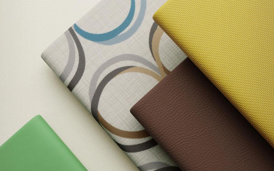 Designtex silicone upholstery in patterned, yellow, brown and green colourways
