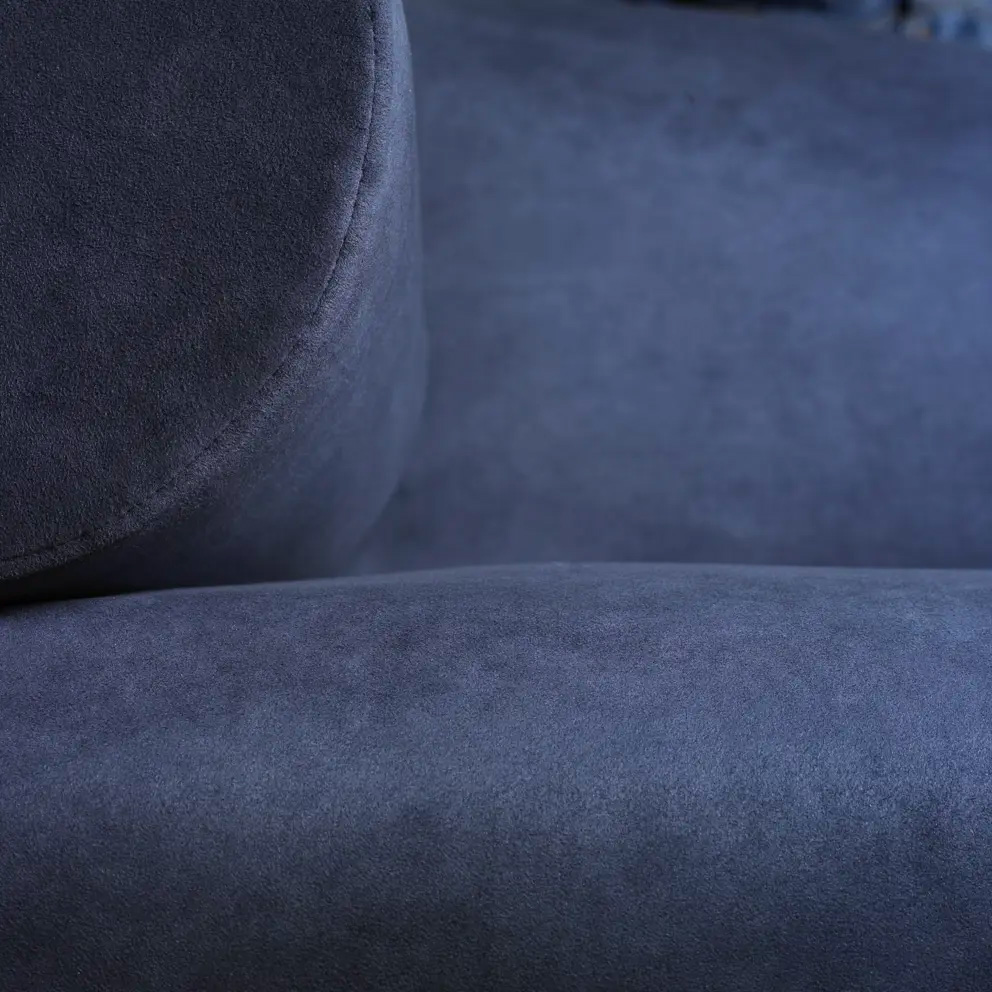 Navy microfibre on a sofa, close up