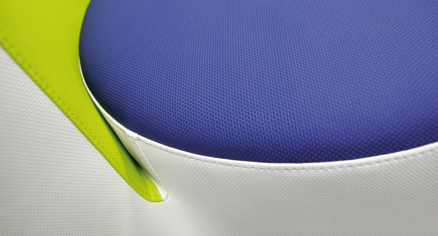 skai Venezia: close-up of a blue upholstered seat with lime green trim