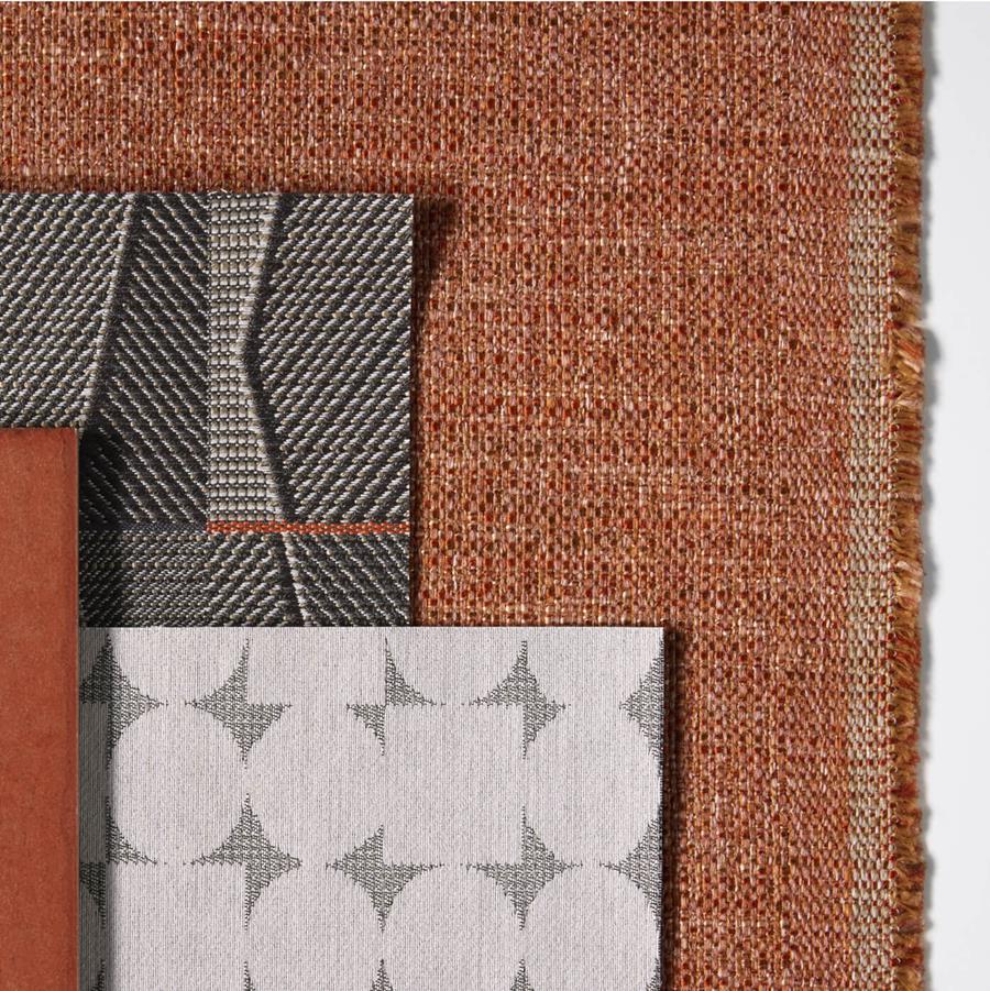 Rust Designtex Marl with grey and white patterned fabrics