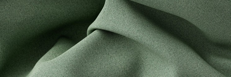 Folds of green Cura Loop fabric