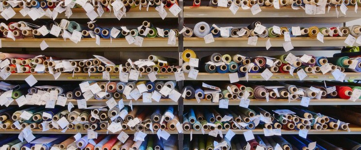 Shelves of labelled yarn cones
