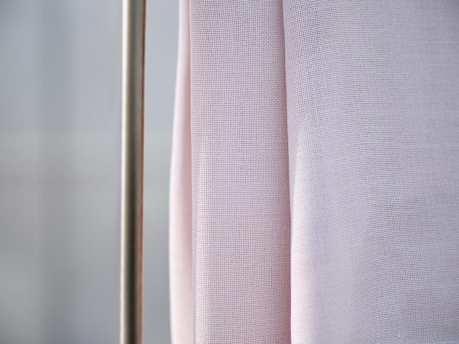 Sand curtains in grey and pink, close-up