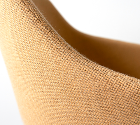 Close-up of a chair in mustard Gabriel upholstery